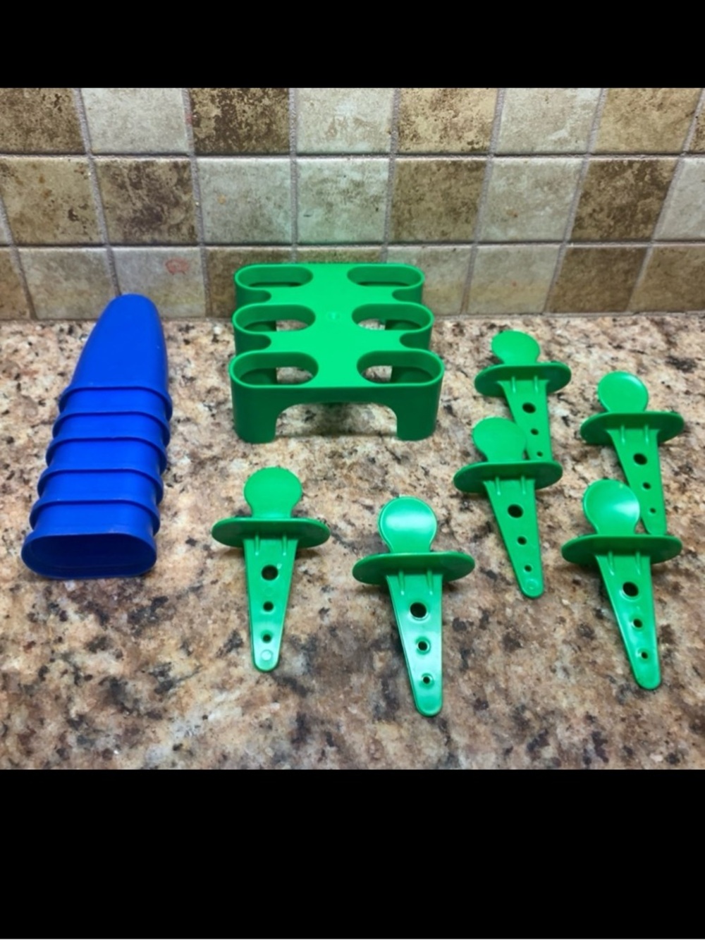 IKEA Plastic Popsicle Maker Molds in Green with Blue Covers and Green Tray.